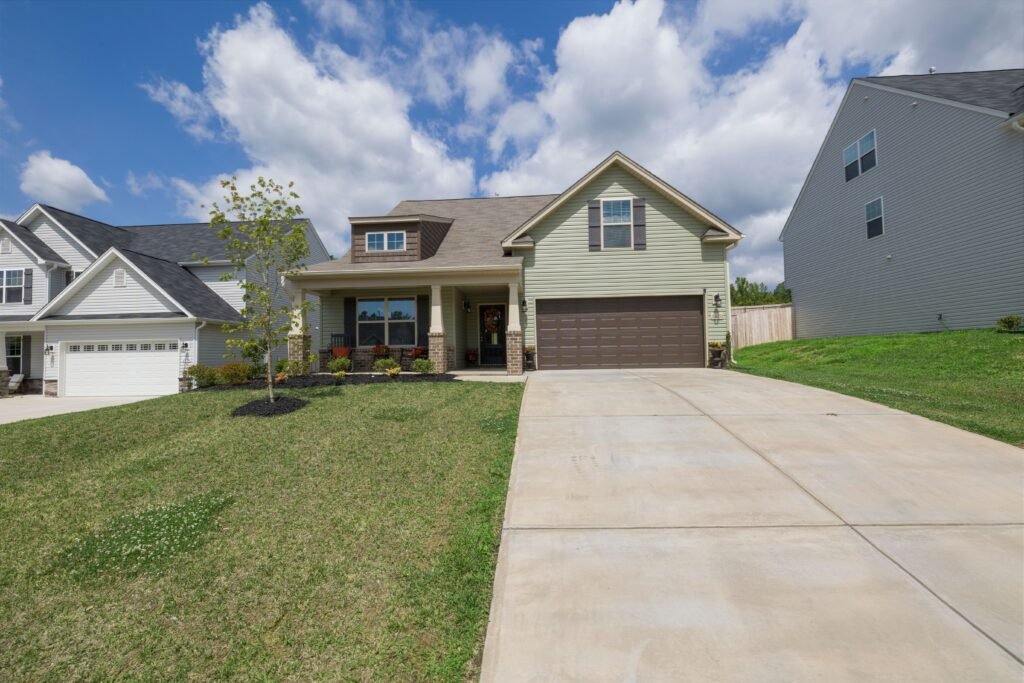 How Much Does It Cost to Install a New Driveway? Concrete vs. Asphalt vs. Pavers (2026 Guide) new driveway cost concrete asphalt pavers 2026