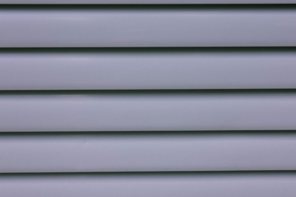 siding replacement cost vinyl fiber cement 2026